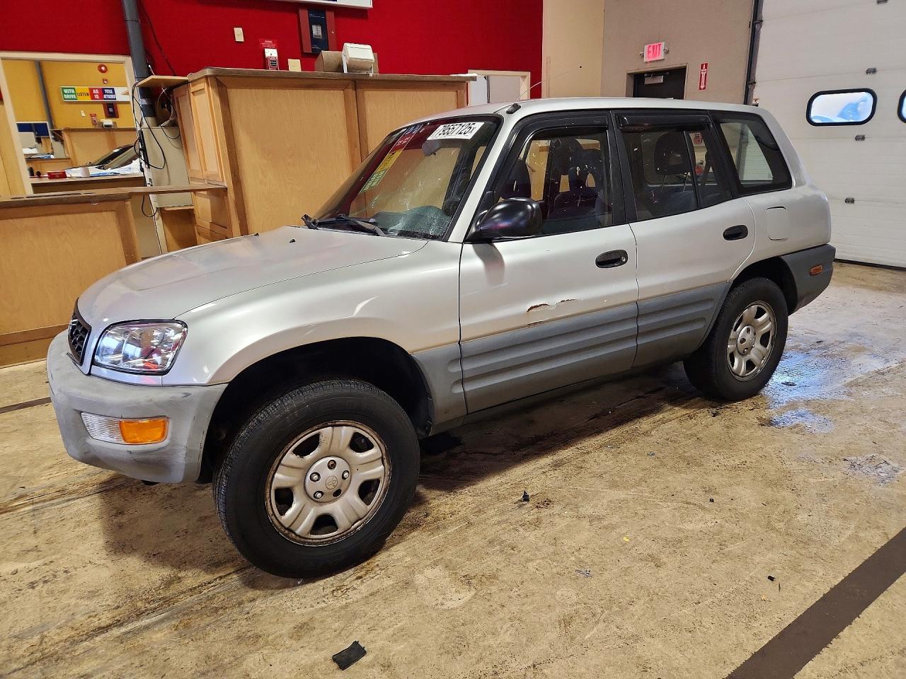 1998 Toyota RAV4, VIN JT3HP10VXW7104290 — Side