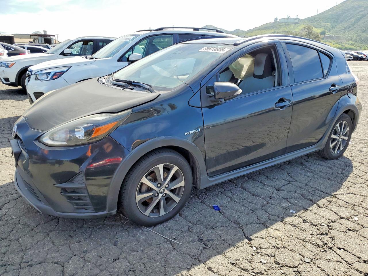 2018 Toyota Prius Two, VIN JTDKDTB34J1613689 — Side