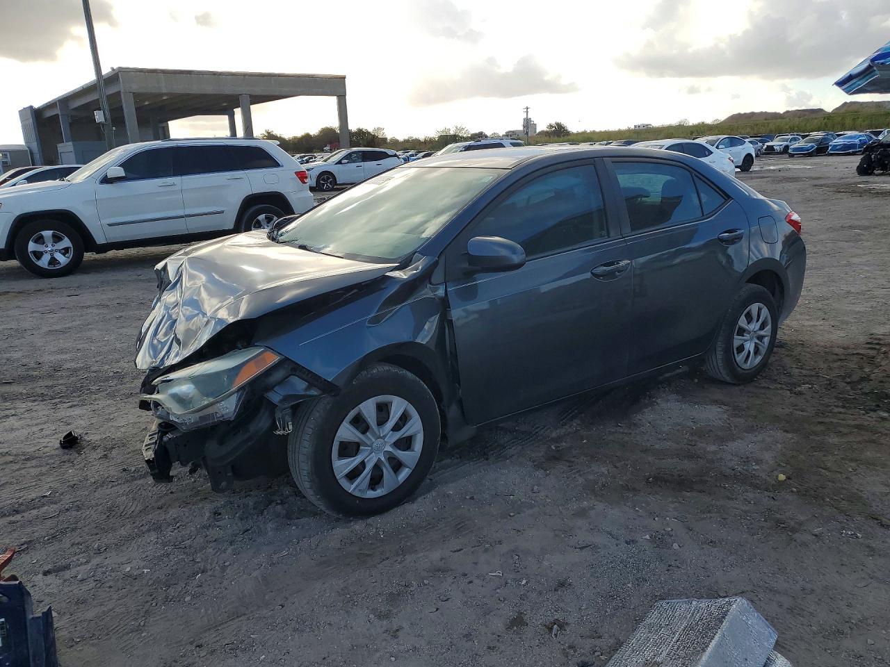 2016 Toyota Corolla L, VIN 2T1BURHE9GC699355 — Front end