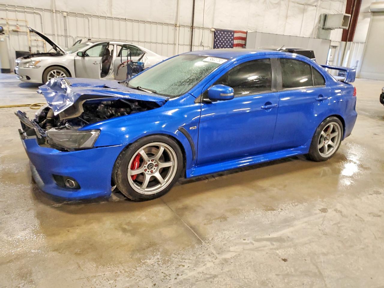 2015 Mitsubishi Lancer Evolution GSR, VIN JA32W8FV4FU026593 — Front end