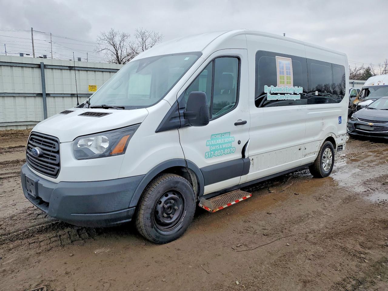 2017 Ford Transit Passenger XLT, VIN 1FBZX2CM4HKA11875 — Rear end