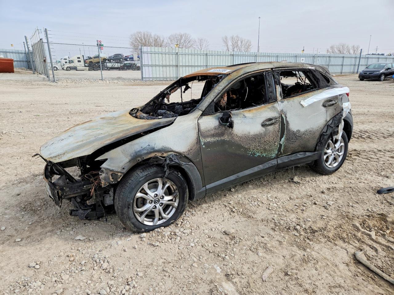 2016 Mazda CX-3 Touring, VIN JM1DKFC7XG0138937 — Burn