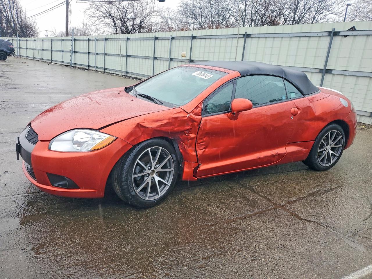 2011 Mitsubishi Eclipse GS Sport, VIN 4A37L5EF4BE005009 — Side