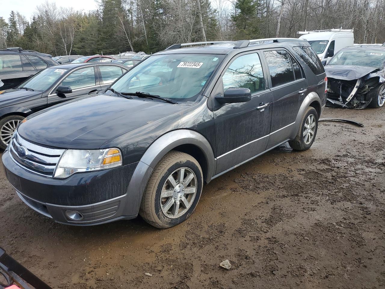 2008 Ford Taurus X SEL, VIN 1FMDK02W38GA32114 — Side
