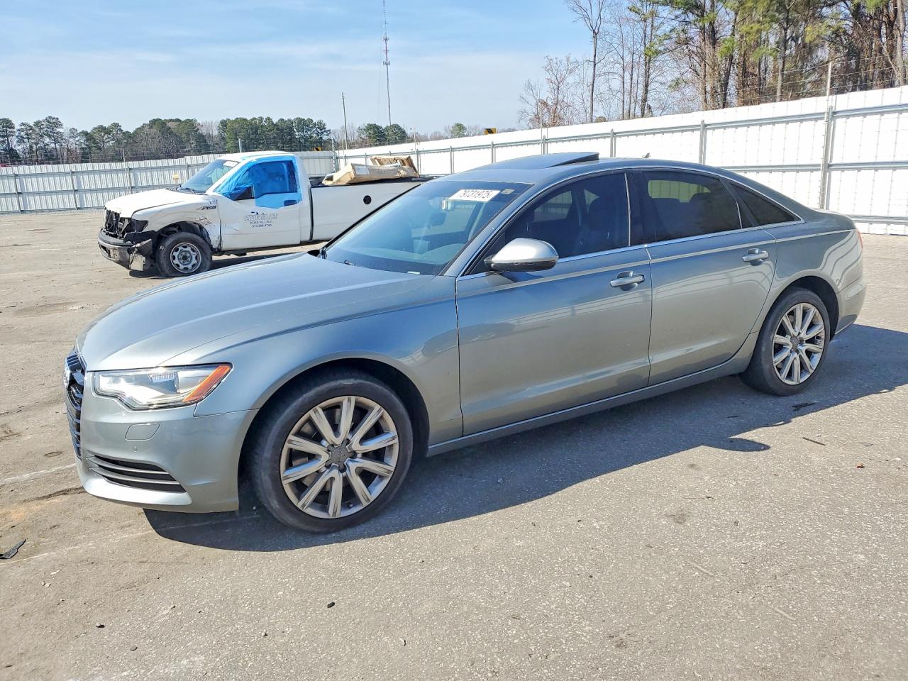 2014 Audi A6 Premium Plus, VIN WAUGFAFC2EN089663 — Side