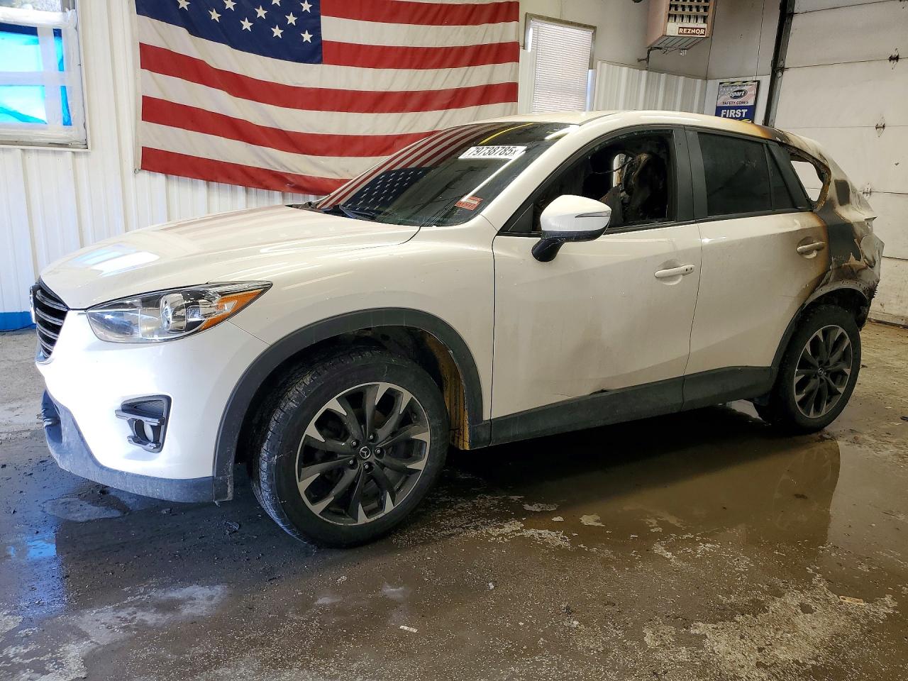 2016 Mazda CX-5 Grand Touring, VIN JM3KE4DY0G0874254 — Interior fire