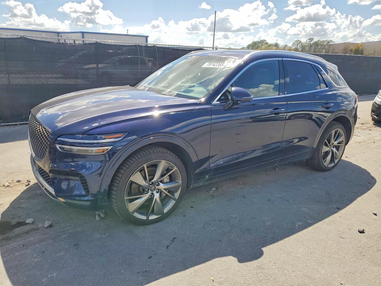 2024 Genesis GV70 2.5T, VIN KMUMADTB9RU161811 — Side