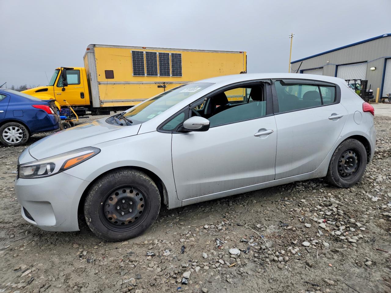 2017 Kia Forte LX, VIN KNAFK5A83H5682616 — Side