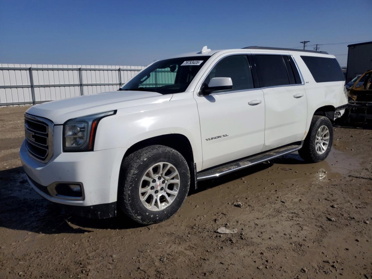 2016 GMC Yukon XL SLT, VIN 1GKS2GKCXGR268535 — Rear end
