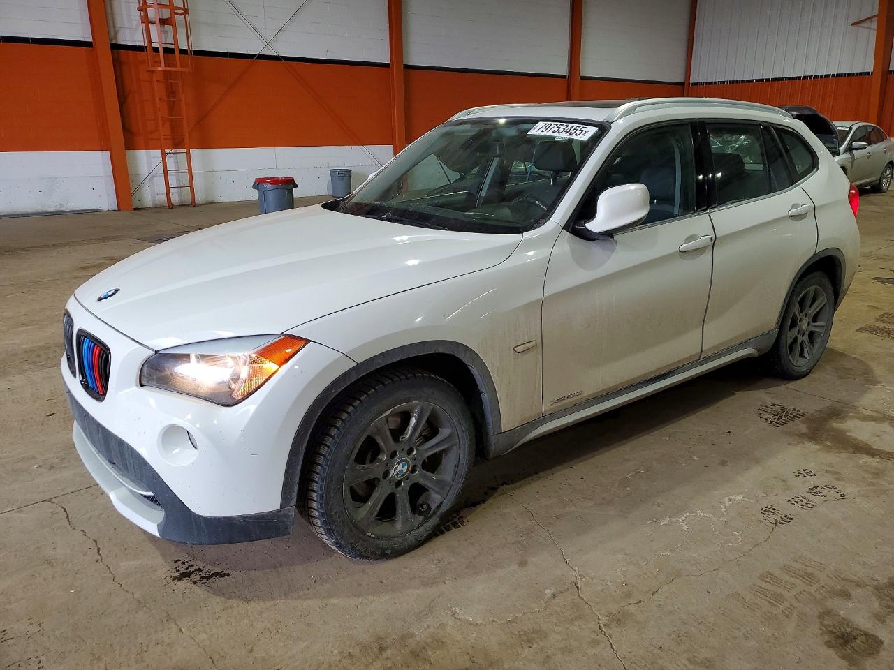 2012 BMW X1 28i, VIN WBAVL1C57CVR78980 — Hail