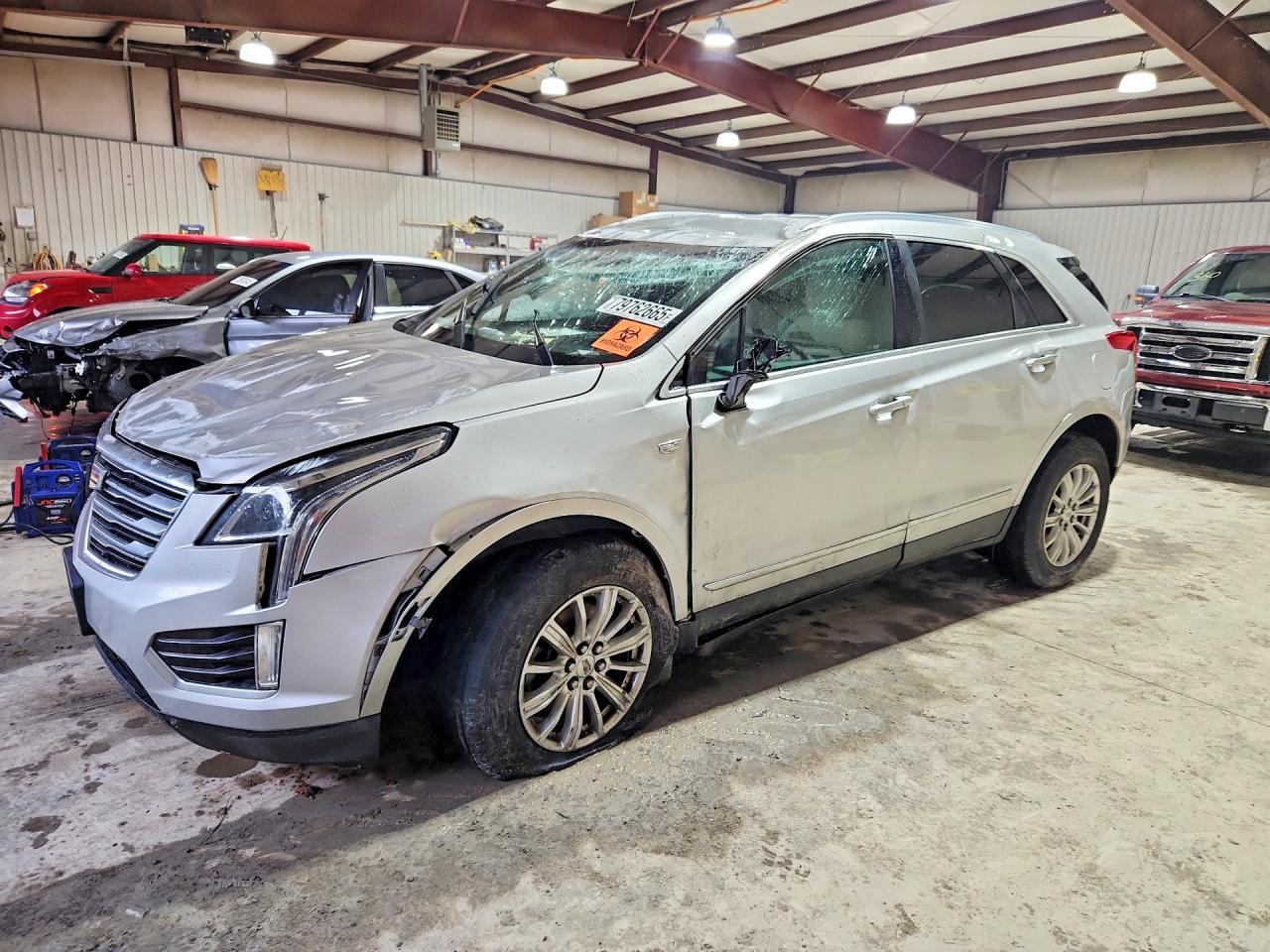 2017 Cadillac XT5 FWD, VIN 1GYKNARS5HZ211734 — Rollover