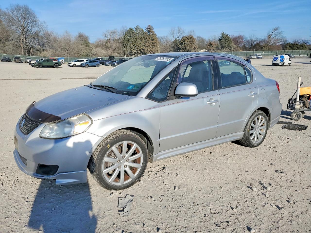 2010 Suzuki SX4 Sport S, VIN JS2YC5A43A6310110 — Side