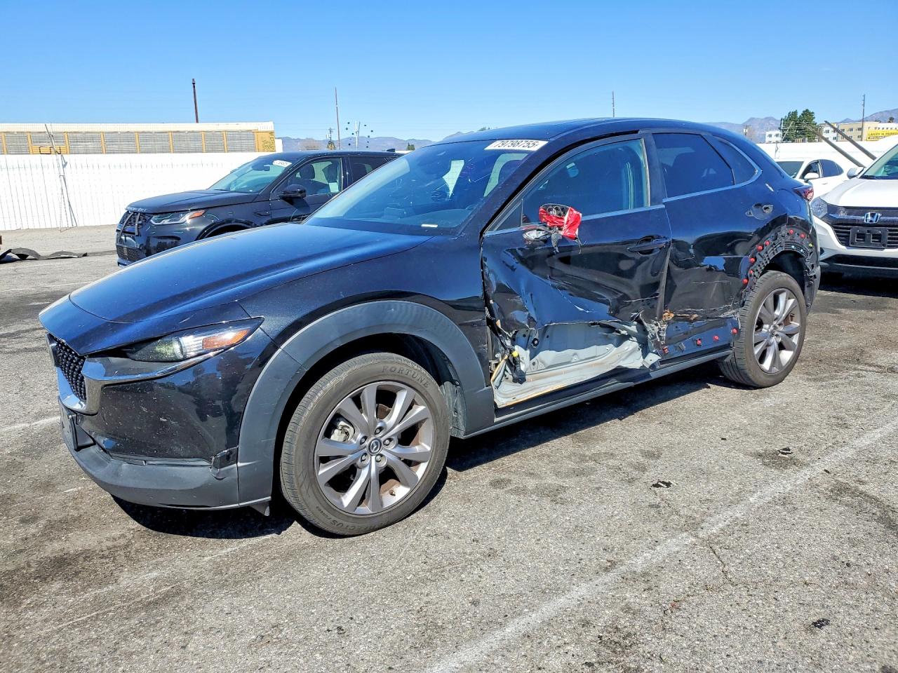 2021 Mazda CX-30 Preferred, VIN 3MVDMACL9MM302860 — Side