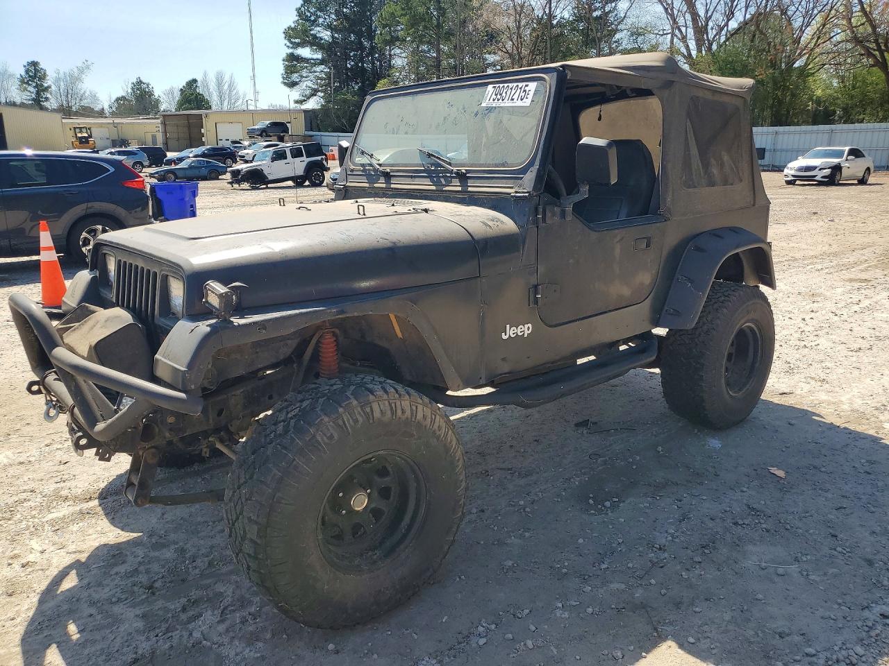 1989 Jeep Wrangler, VIN 2J4FY59T2KJ142185 — Minor dents and scratches