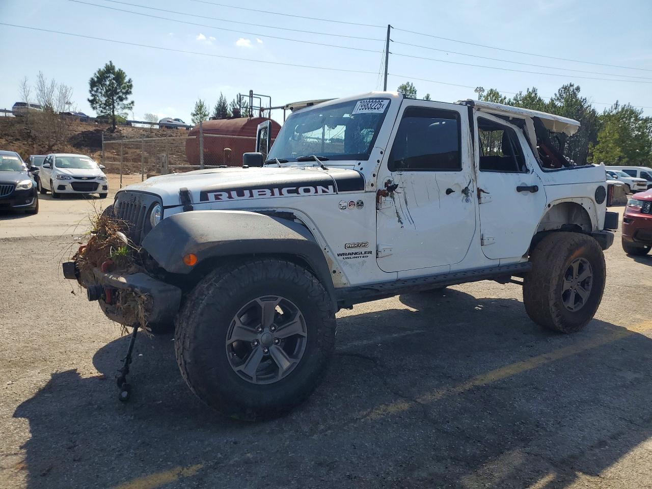 2017 Jeep Wrangler Unlimited Rubicon Hard Rock, VIN 1C4BJWFG4HL711093 — Rollover
