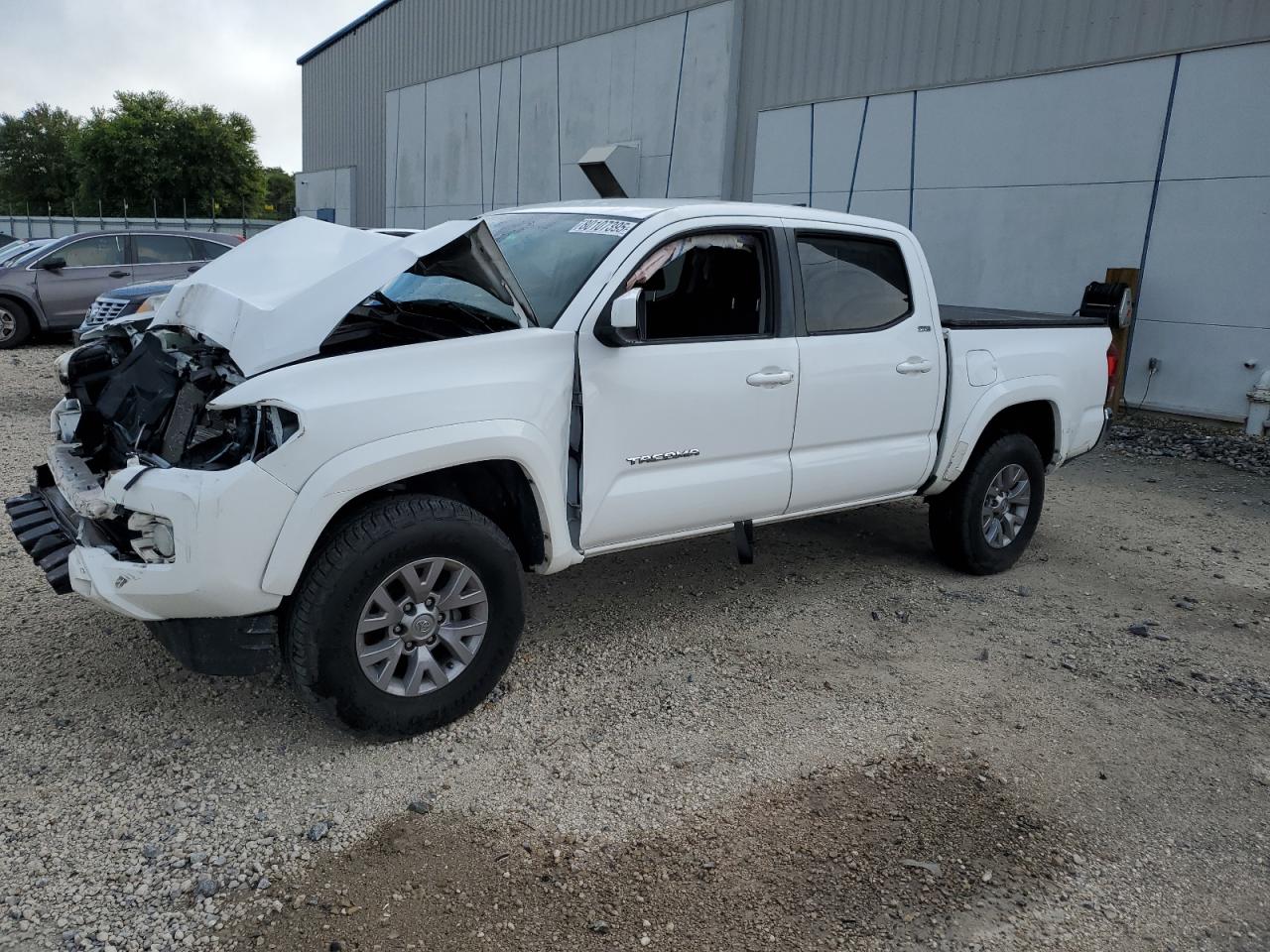 2019 Toyota Tacoma SR5, VIN 3TMAZ5CN9KM107272 — Front end
