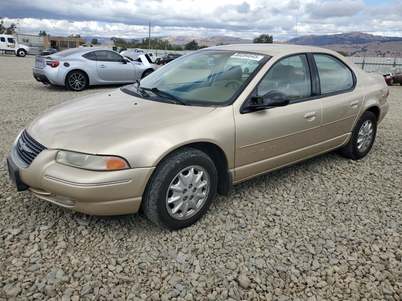 2000 Chrysler Cirrus LXi, VIN 1C3EJ56H7YN182358 — Minor dents and scratches
