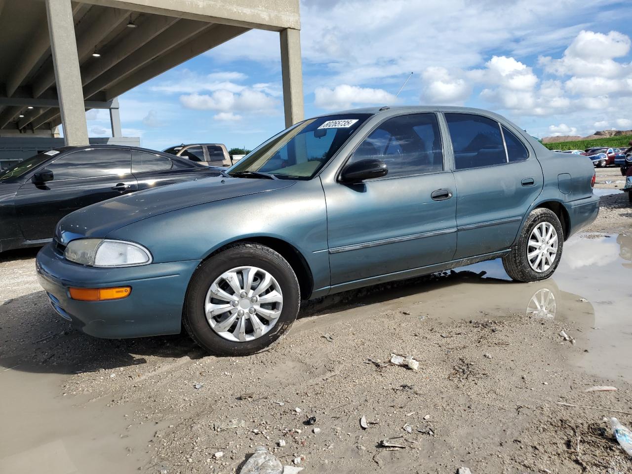 1995 Chevrolet Prizm, VIN 1Y1SK5282SZ017458 — Side