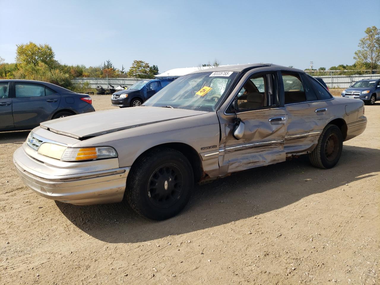 1995 Ford Crown Victoria LX, VIN 2FALP74WXSX139093 — Side
