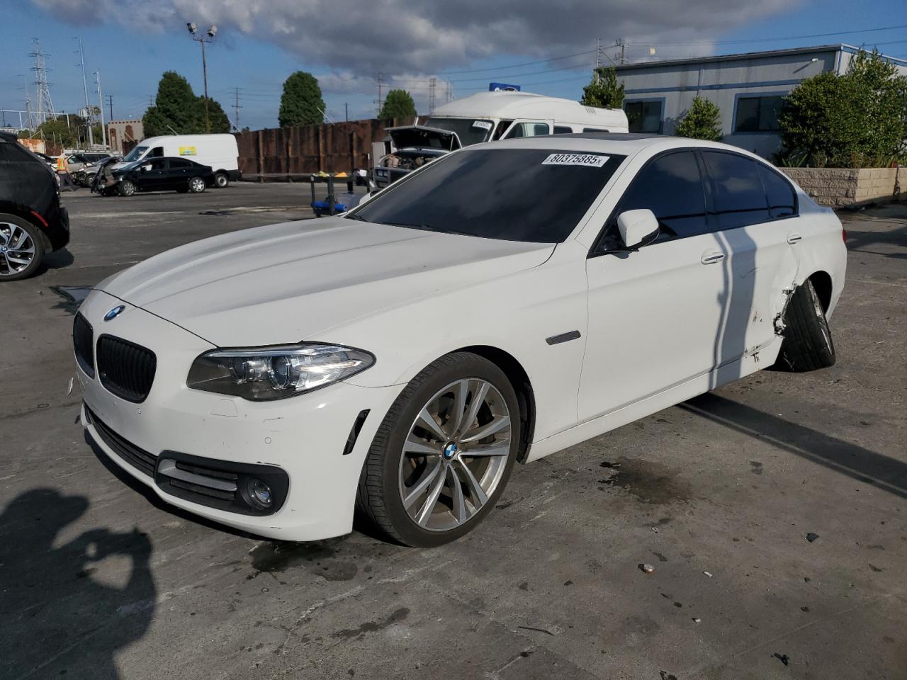 2016 BMW 5 Series 528i, VIN WBA5A5C54GG354898 — Side