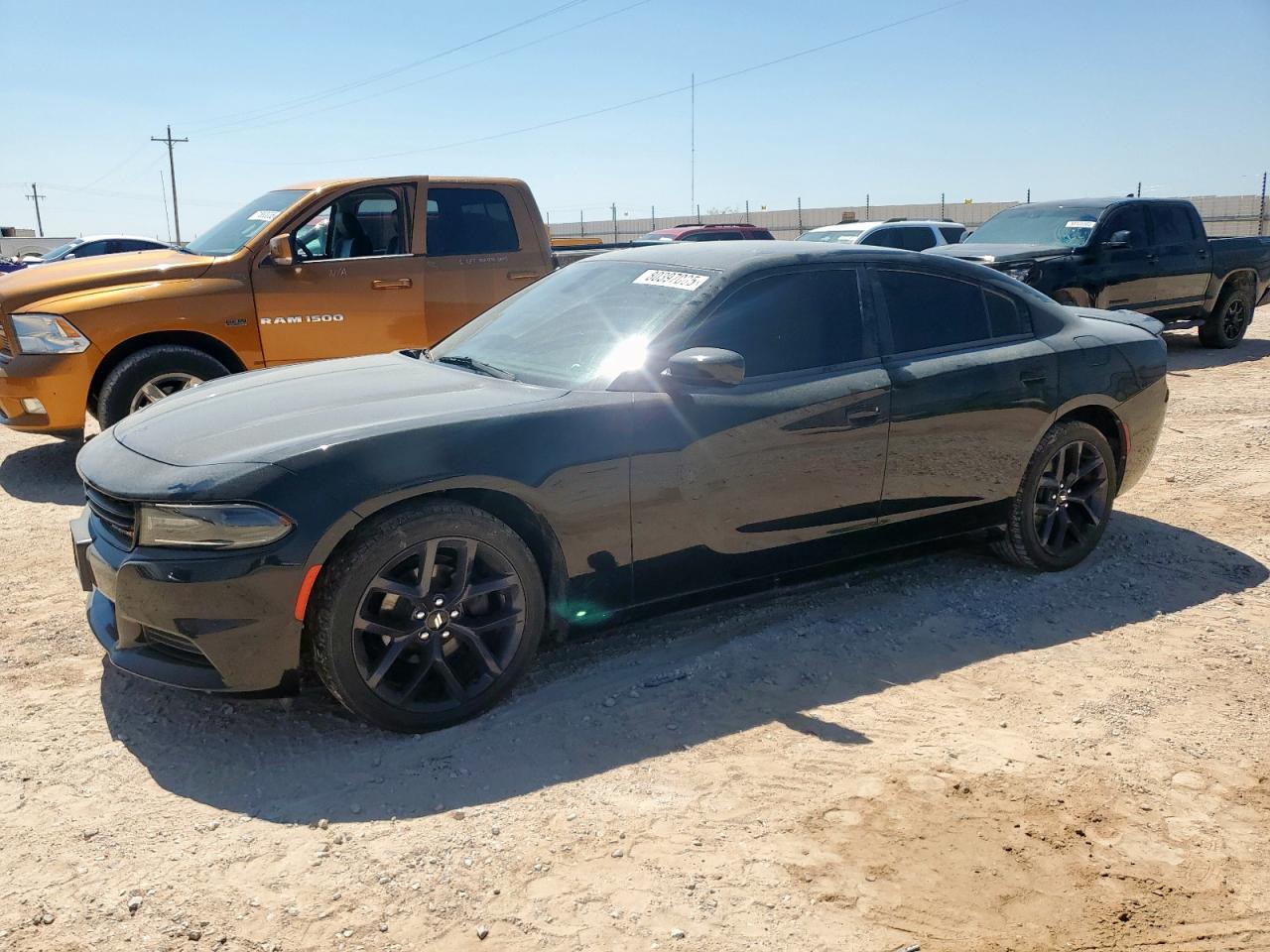 2019 Dodge Charger SXT, VIN 2C3CDXBG7KH716482 — Auction photo 1 of 12
