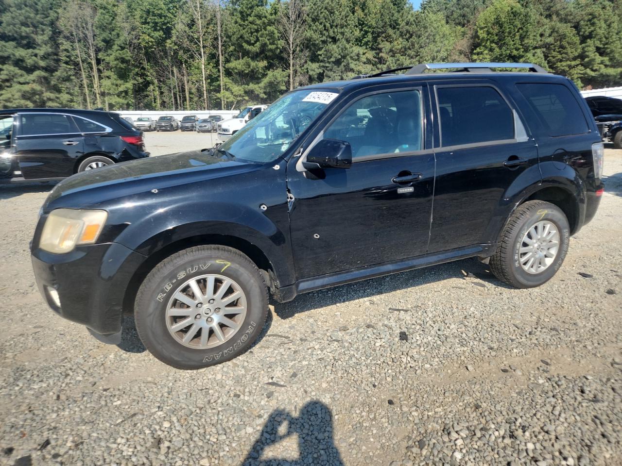 2010 Mercury Mariner Premier, VIN 4M2CN9HGXAKJ20666 — Vandalism