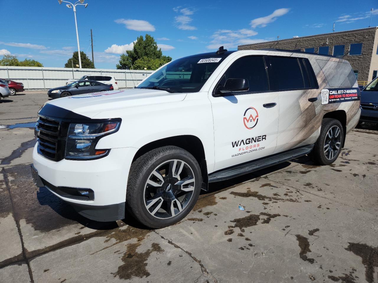 2018 Chevrolet Suburban Premier, VIN 1GNSKJKC5JR353659 — Side