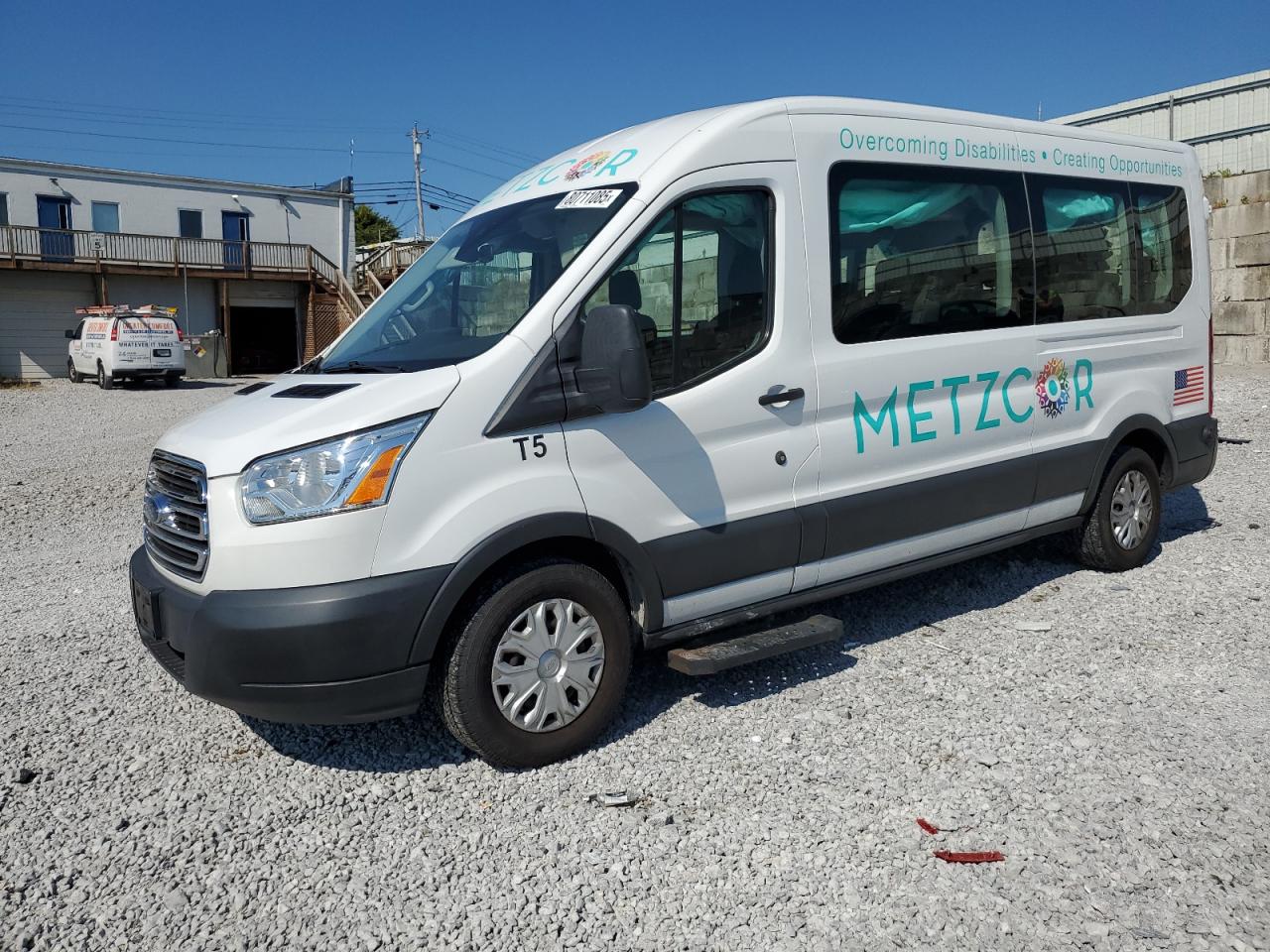 2019 Ford Transit Passenger XL, VIN 1FBAX2CM3KKA48940 — Side