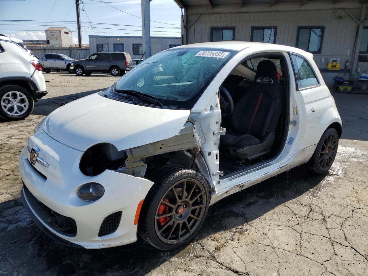 2017 FIAT 500 Abarth, VIN 3C3CFFFH1HT565727 — Side