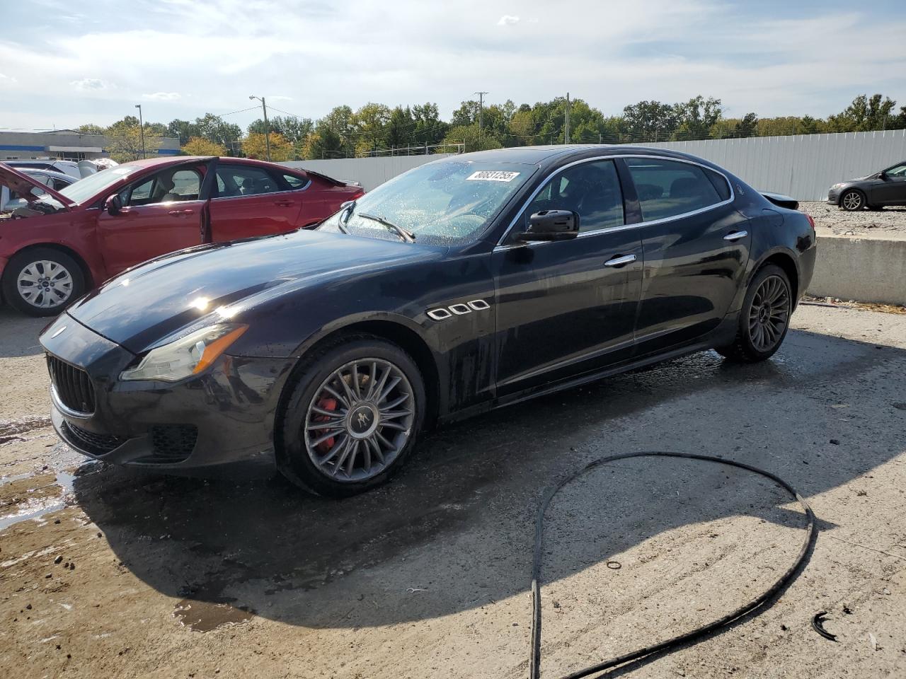 2014 Maserati Quattroporte S Q4, VIN ZAM56RRA0E1077372 — Rear end
