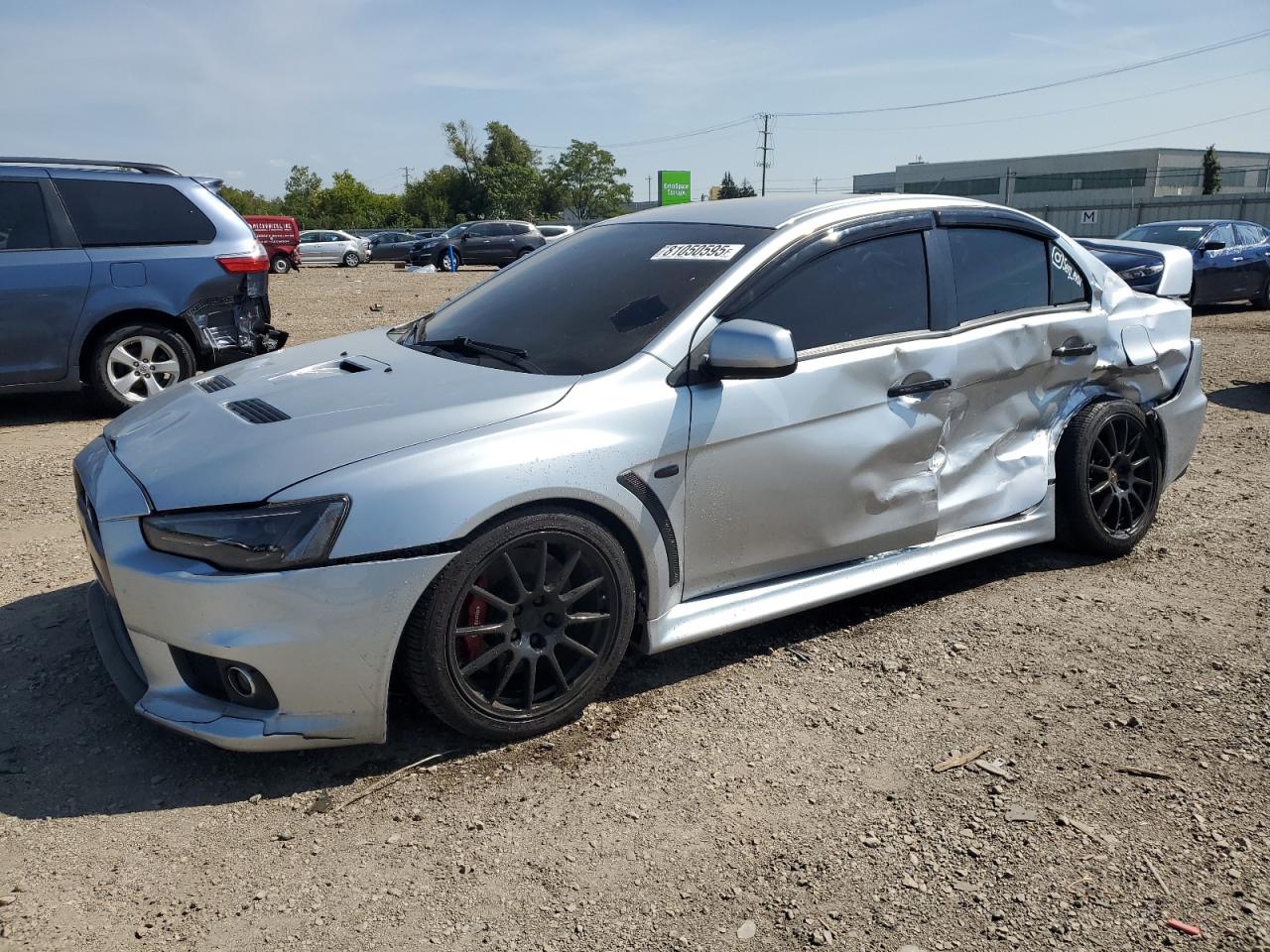 2012 Mitsubishi Lancer Evolution GSR, VIN JA32W8FV4CU012821 — Side
