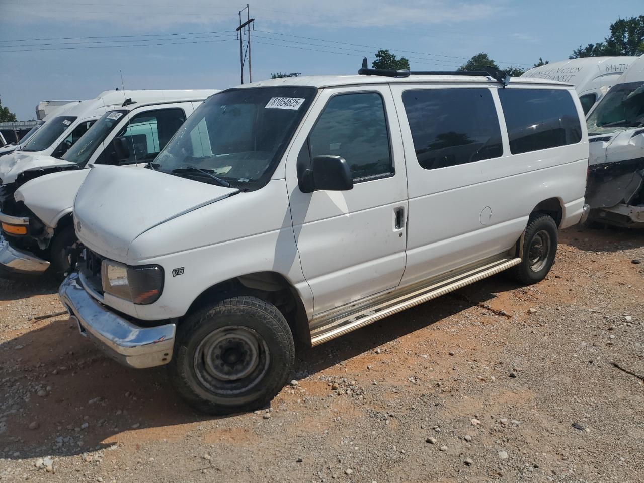 1998 Ford Econoline Wagon XL, VIN 1FBNE31L0WHB14421 — Front end
