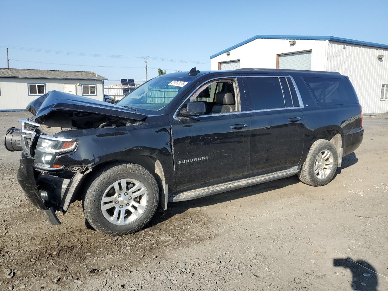 2018 Chevrolet Suburban LT, VIN 1GNSKHKCXJR203555 — Front end
