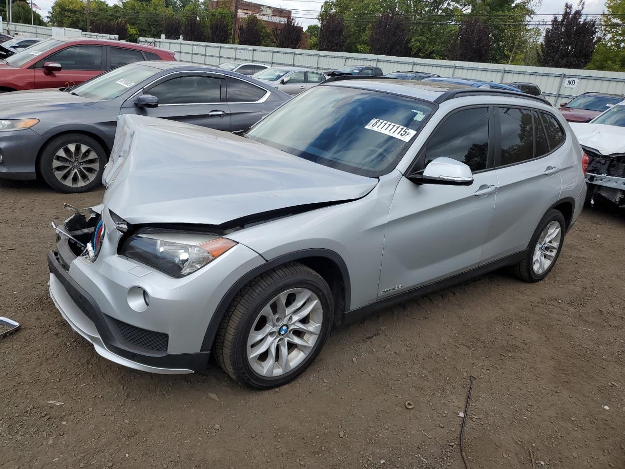 2015 BMW X1 xDrive28i, VIN WBAVL1C57FVY39940 — Front end