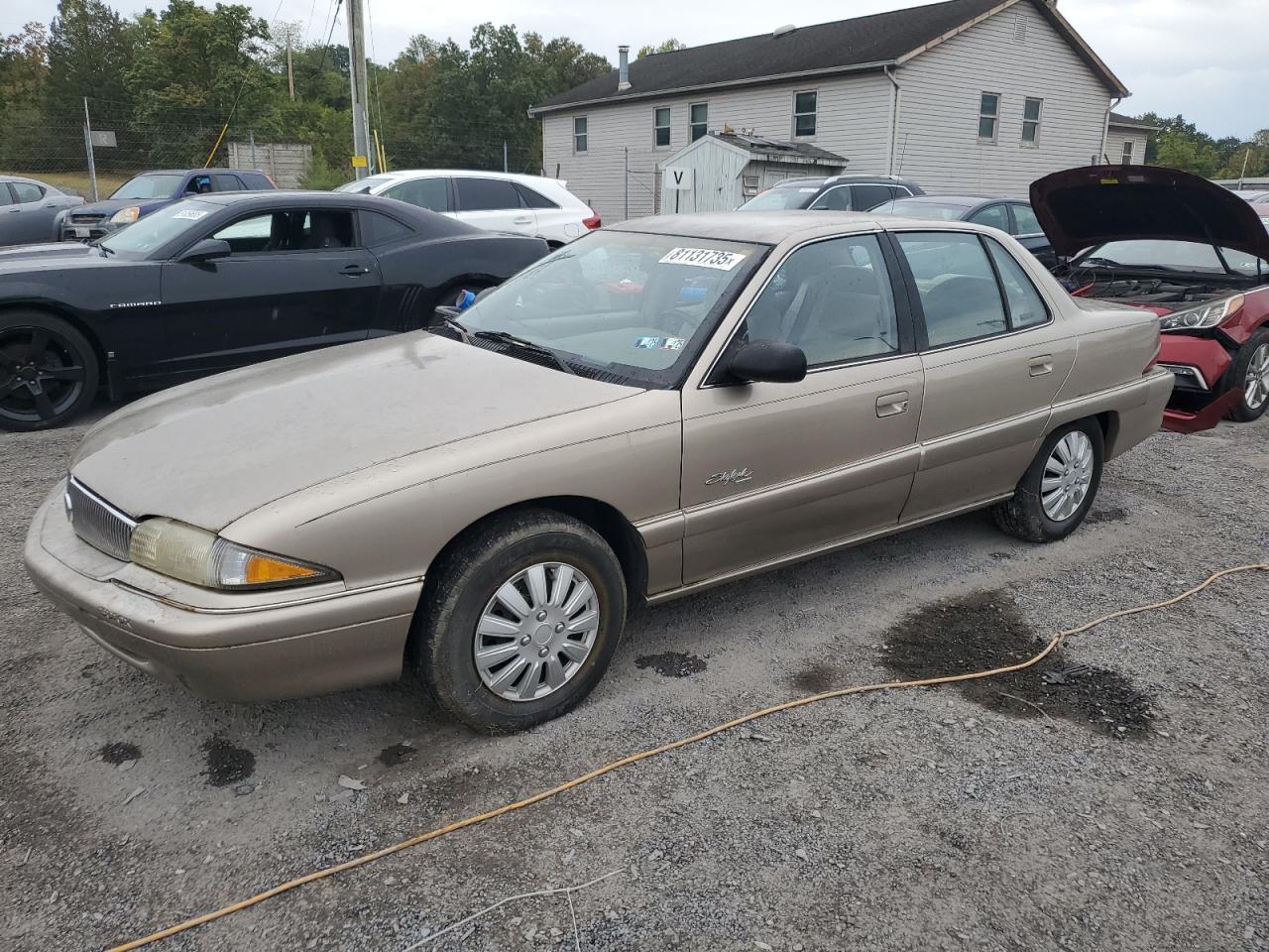 1997 Buick Skylark Gran Sport SC, VIN 1G4NJ52M4VC409572 — Minor dents and scratches