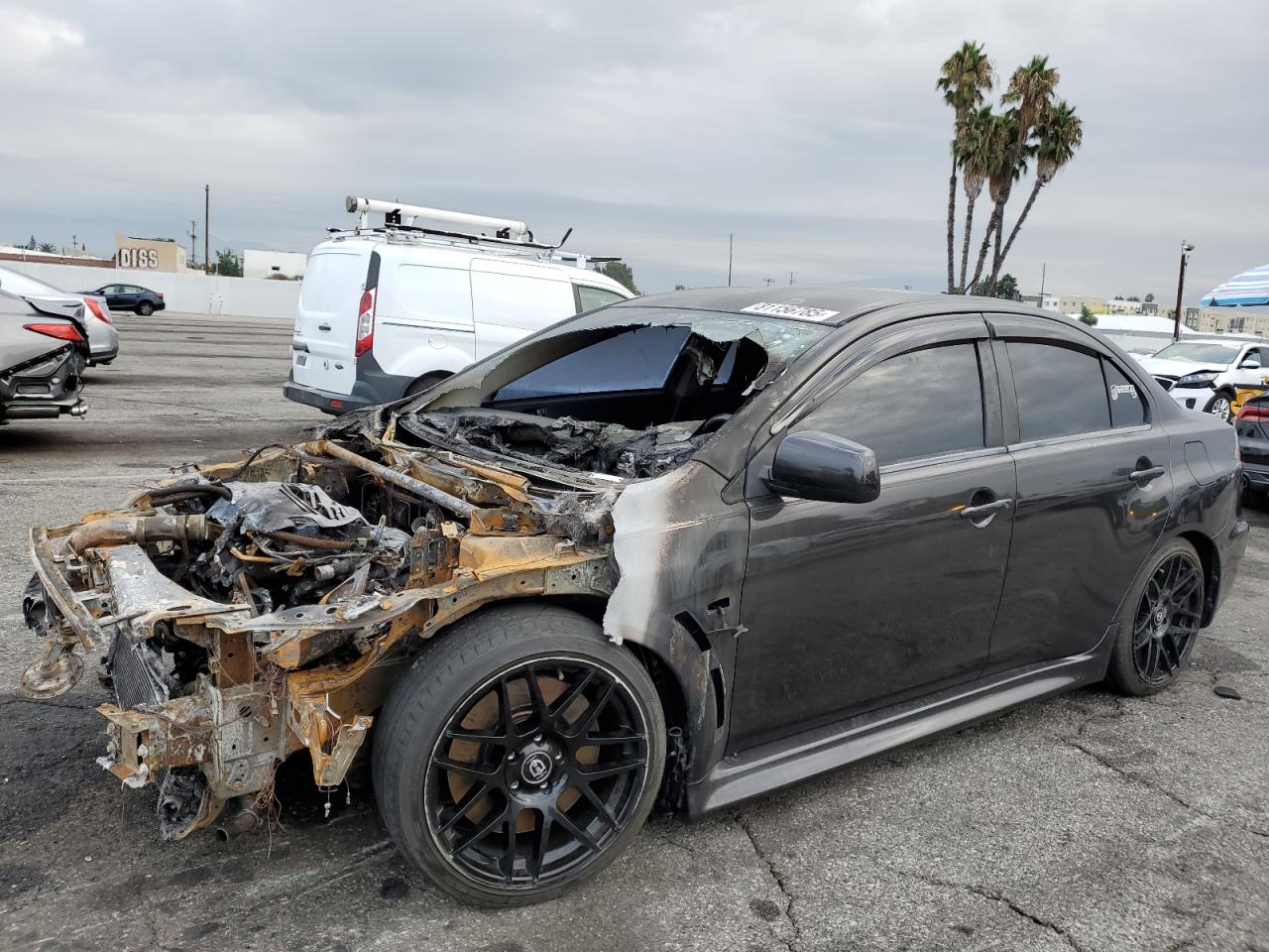2014 Mitsubishi Lancer Evolution GSR, VIN JA32W8FV2EU013114 — Engine fire