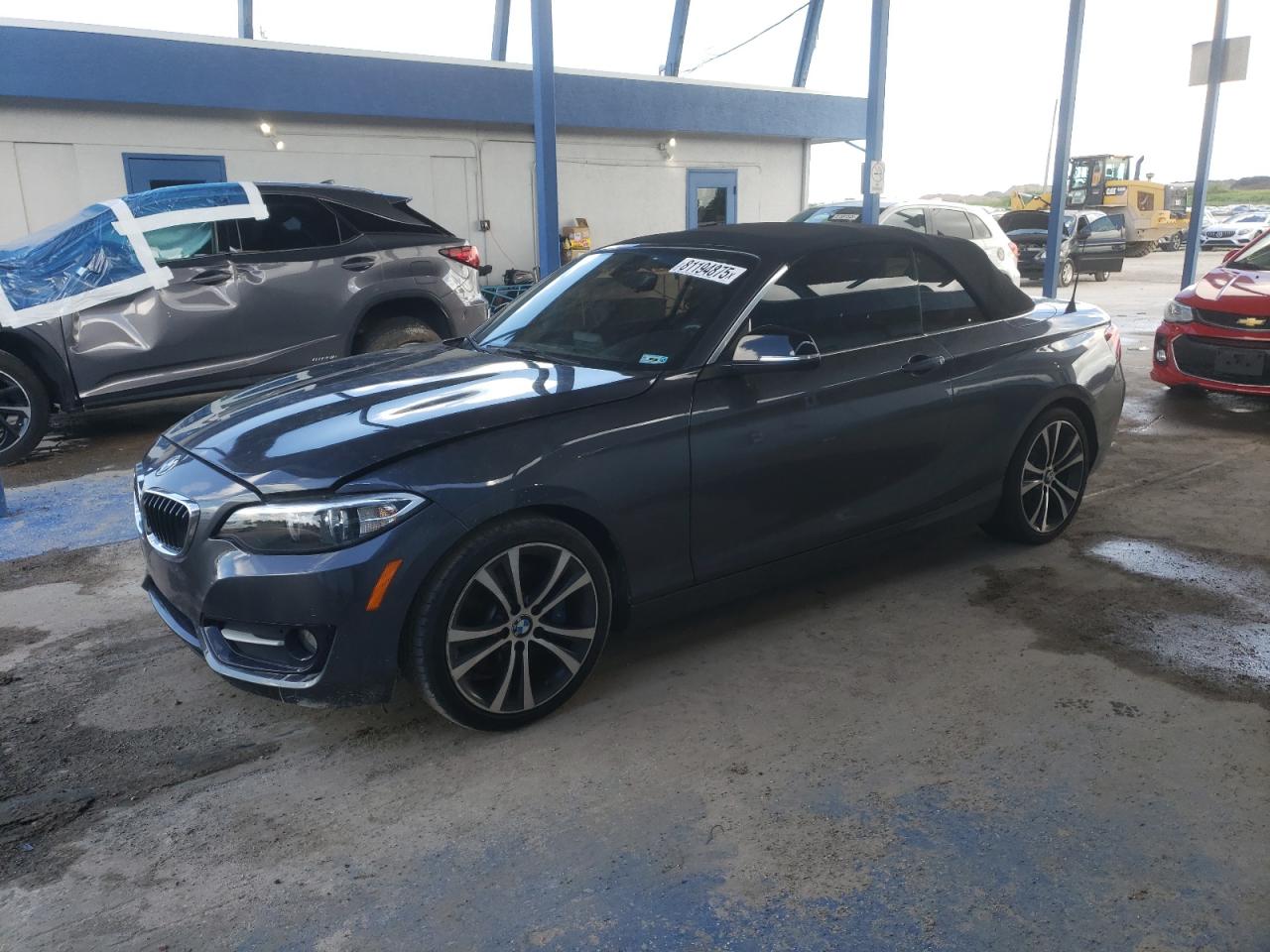 2015 BMW 2 Series 228i, VIN WBA1K5C55FV474179 — Water / flood
