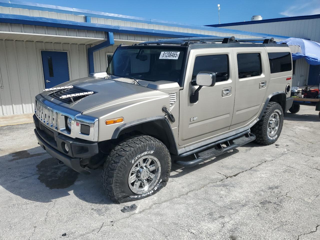 2003 Hummer H2, VIN 5GRGN23U73H138701 — Water / flood