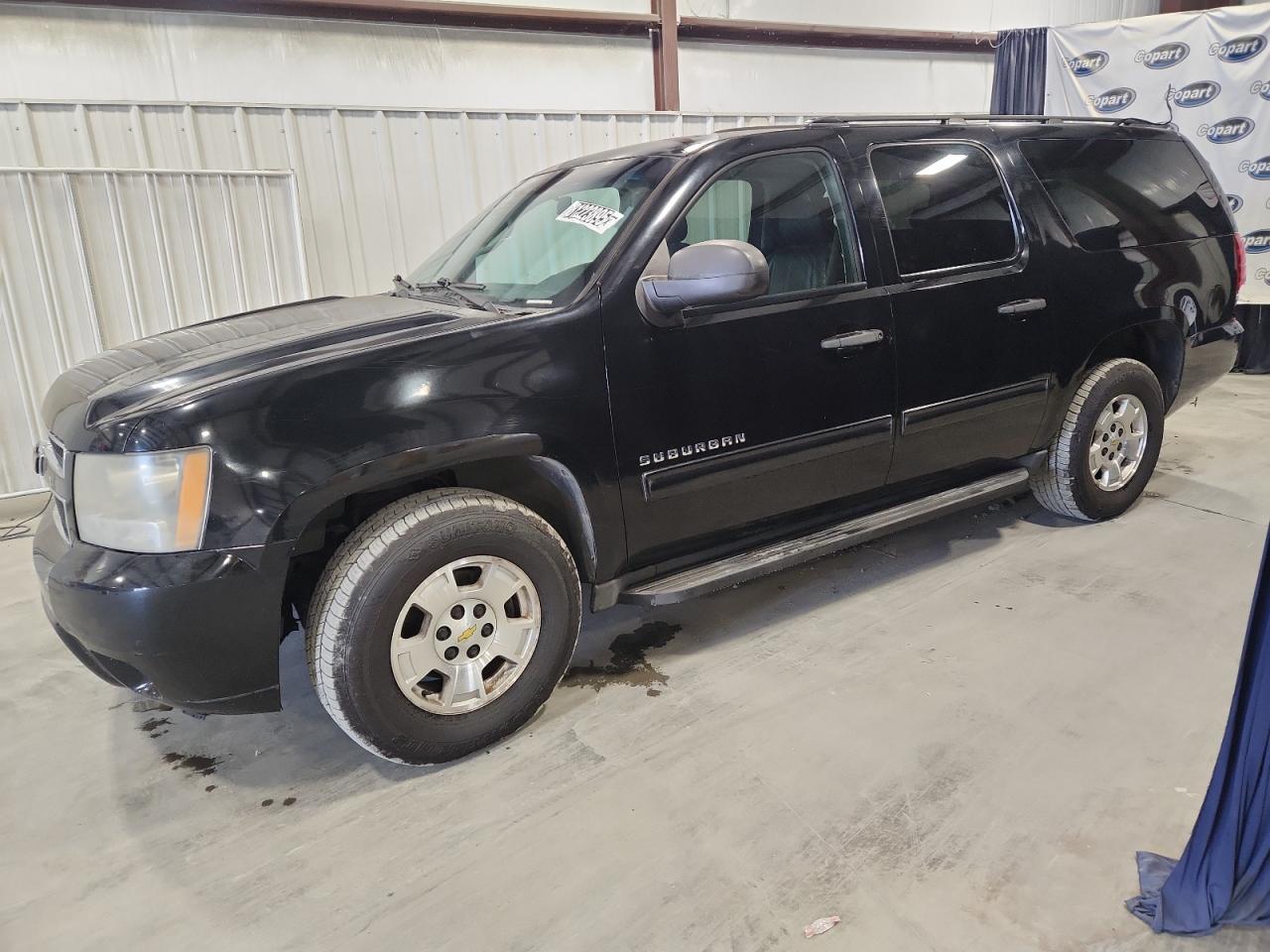 2010 Chevrolet Suburban LS, VIN 1GNUCHE0XAR161346 — Rear end