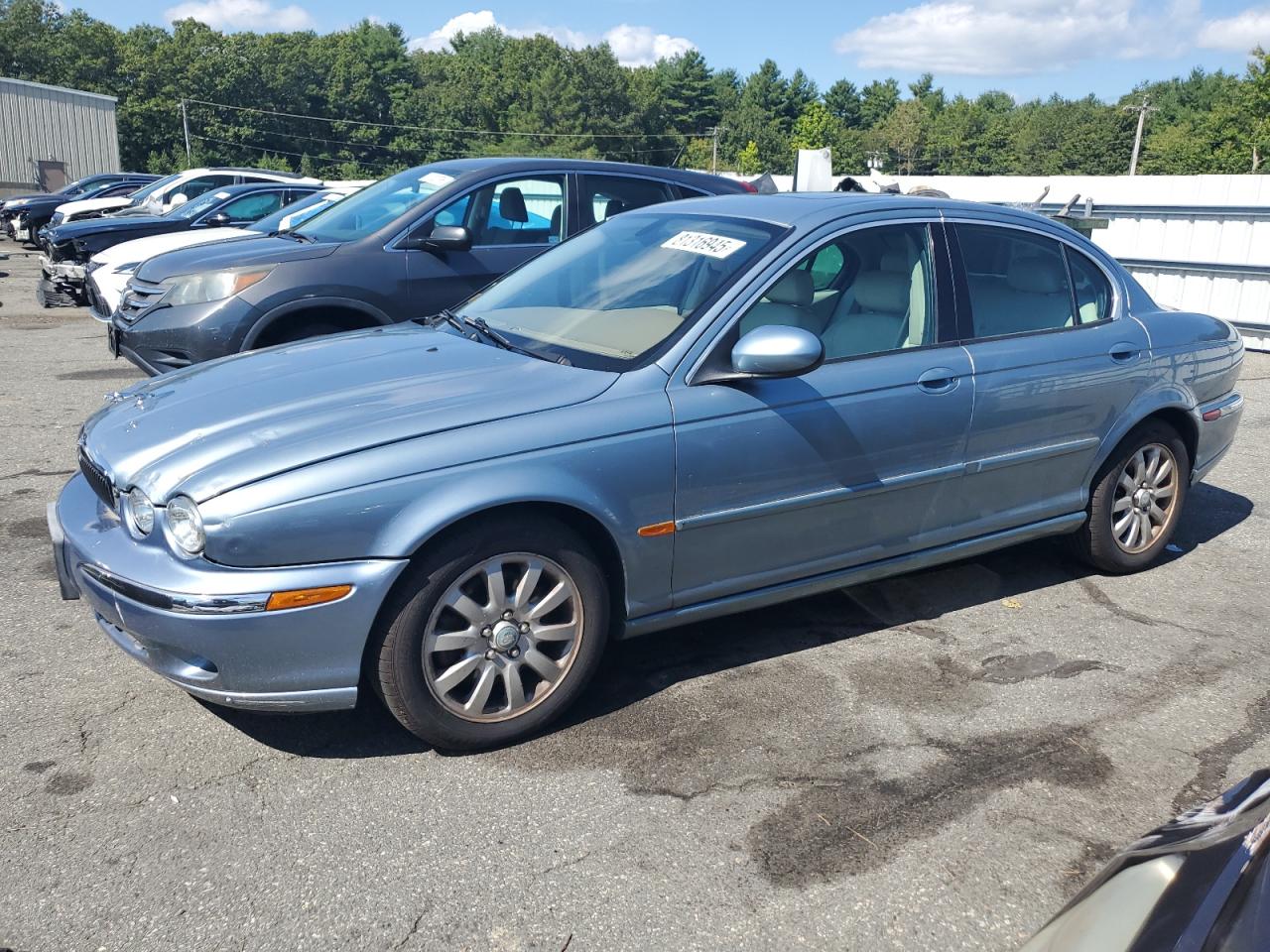 2003 Jaguar X-Type 2.5L Manual, VIN SAJEA51D13XC93893 — Side