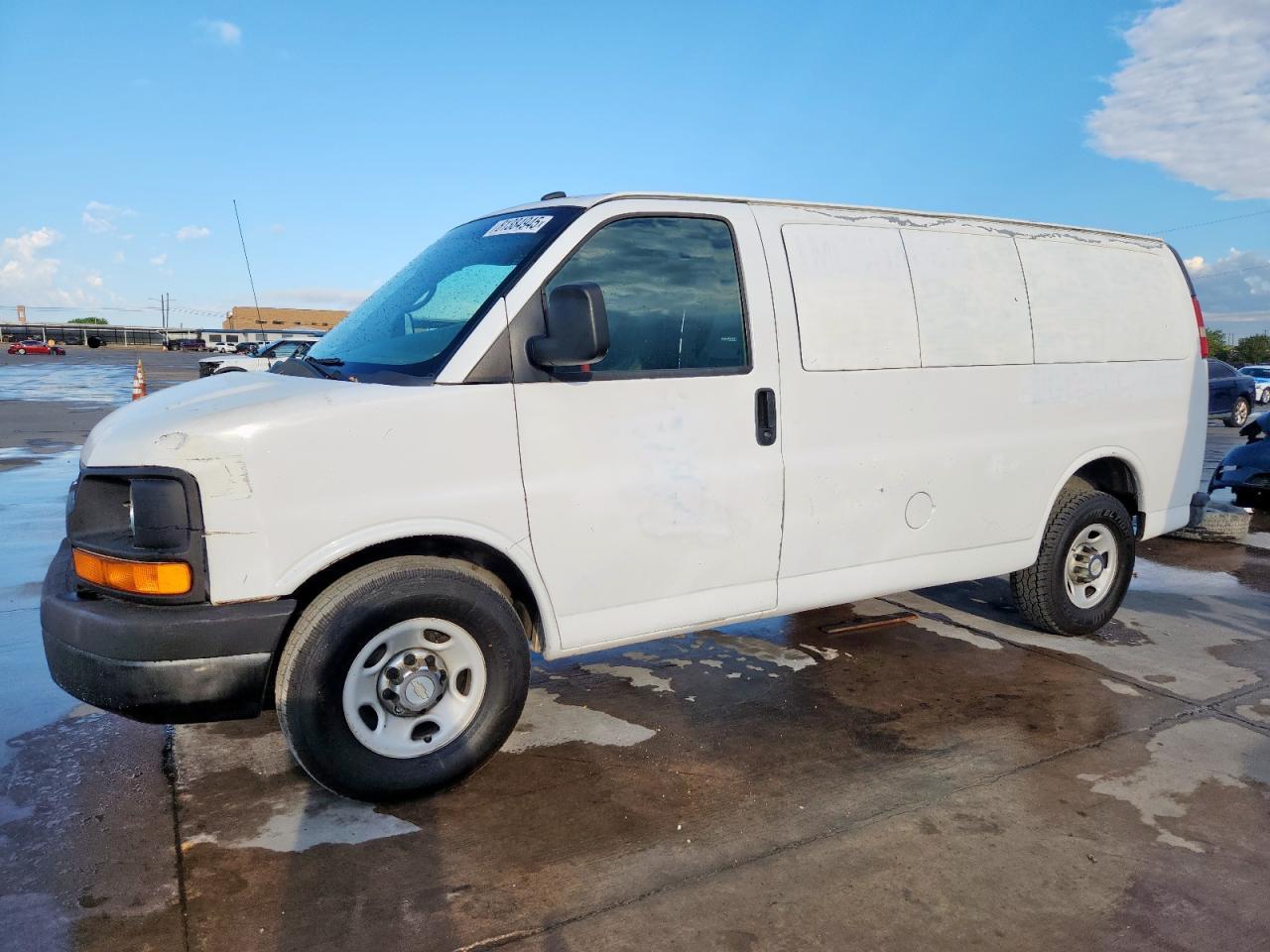 2013 Chevrolet Express Passenger LS, VIN 1GAWGPFA4D1105521 — Side
