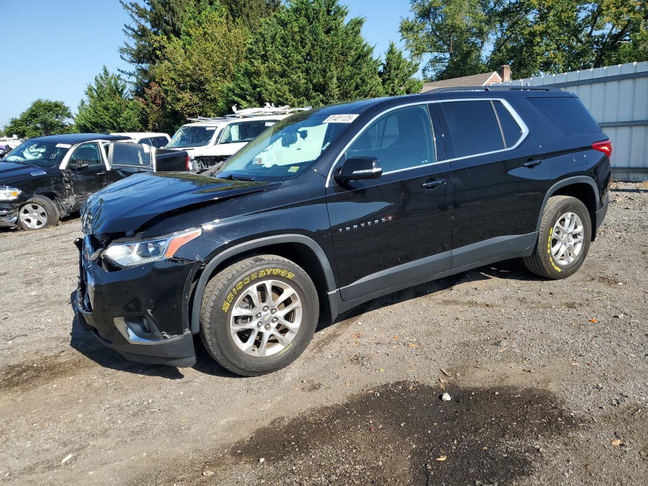 2019 Chevrolet Traverse LT, VIN 1GNEVHKW7KJ310044 — Front end