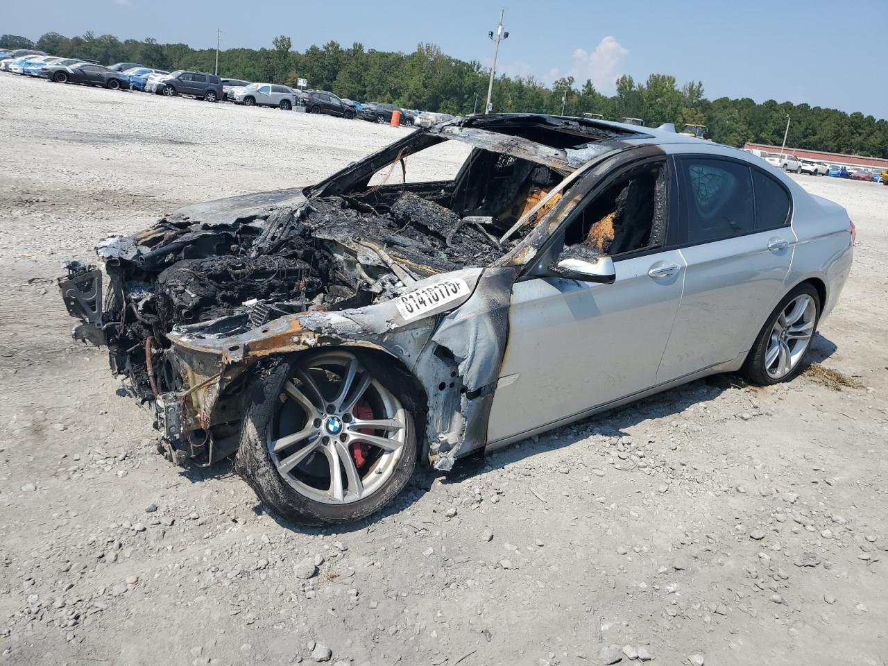 2011 BMW 7 Series 740i, VIN WBAKA4C51BC613117 — Burn