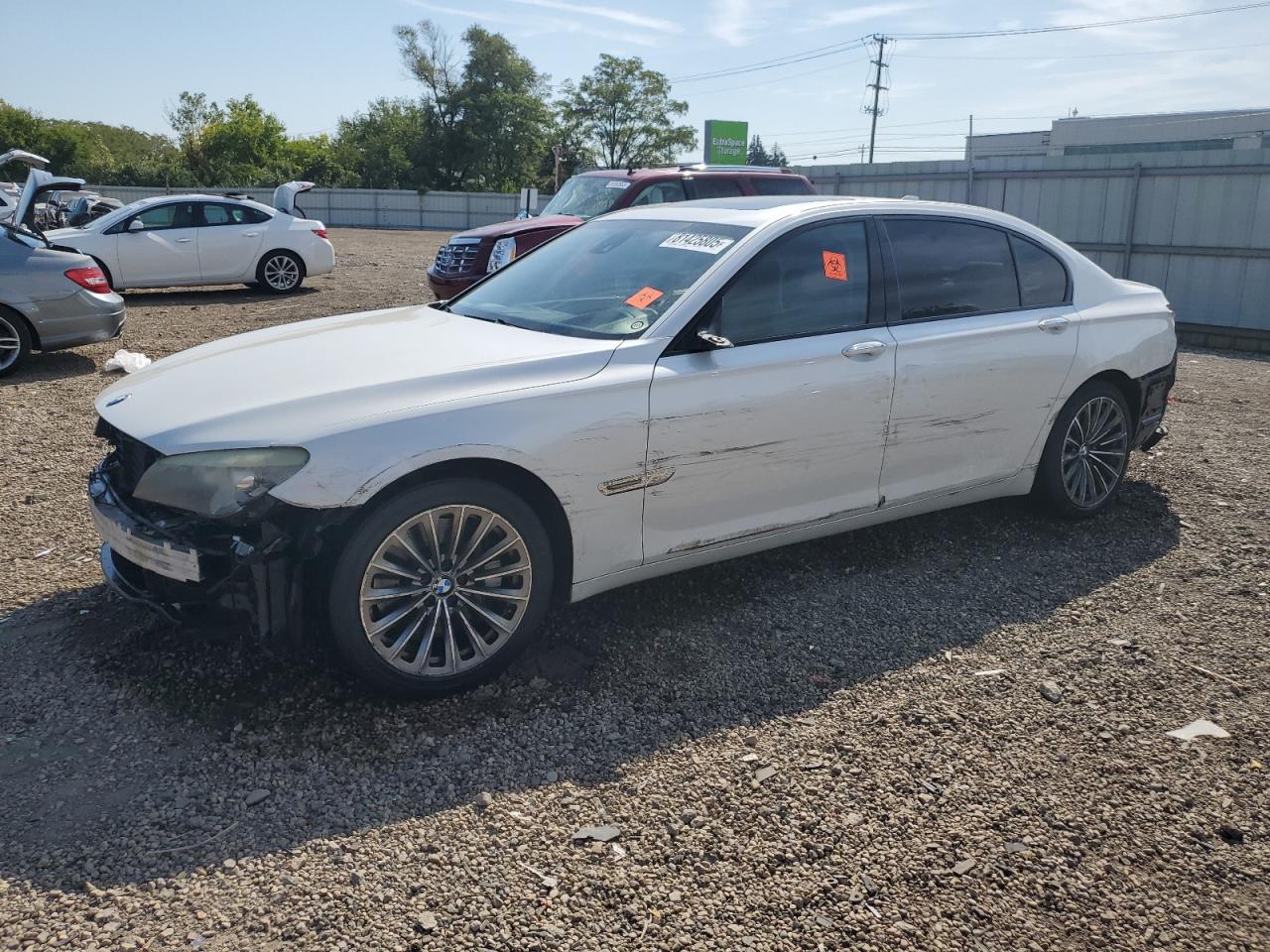 2011 BMW 7 Series 750Li, VIN WBAKB8C58BCY65175 — Side