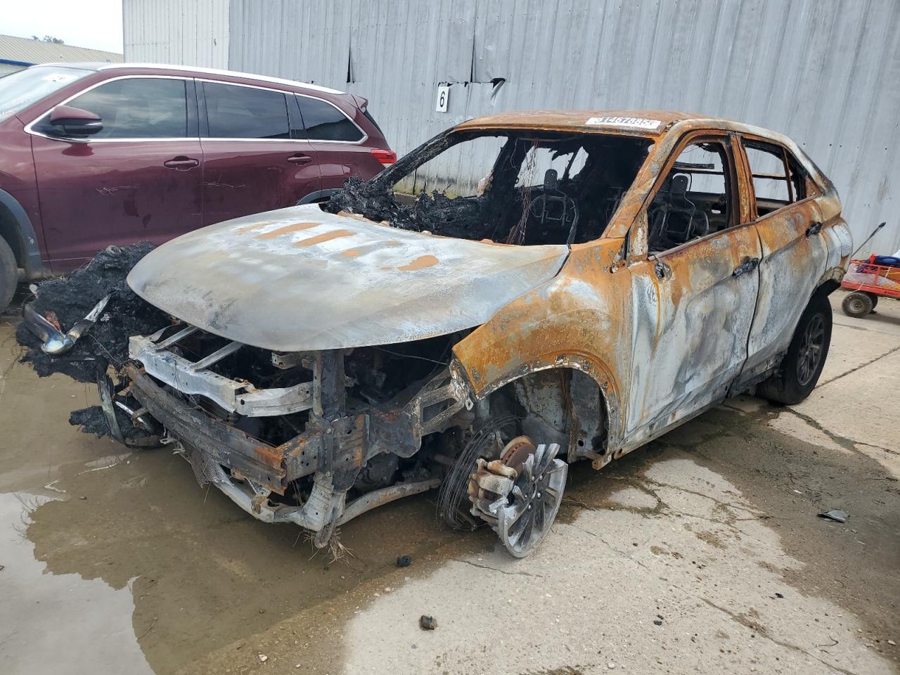 2020 Mitsubishi Eclipse Cross ES, VIN JA4AS3AA2LZ030148 — Burn