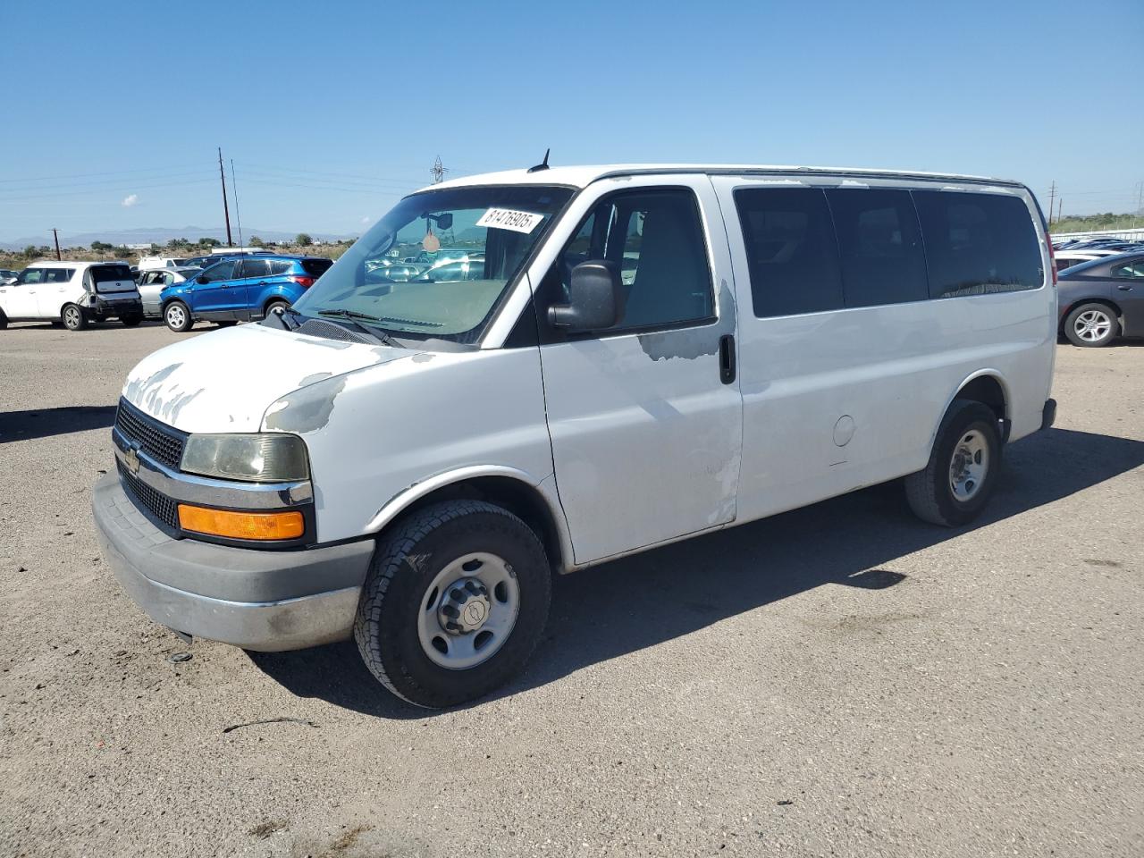 2012 Chevrolet Express G2500, VIN 1GAWGRFA0C1201401 — Side