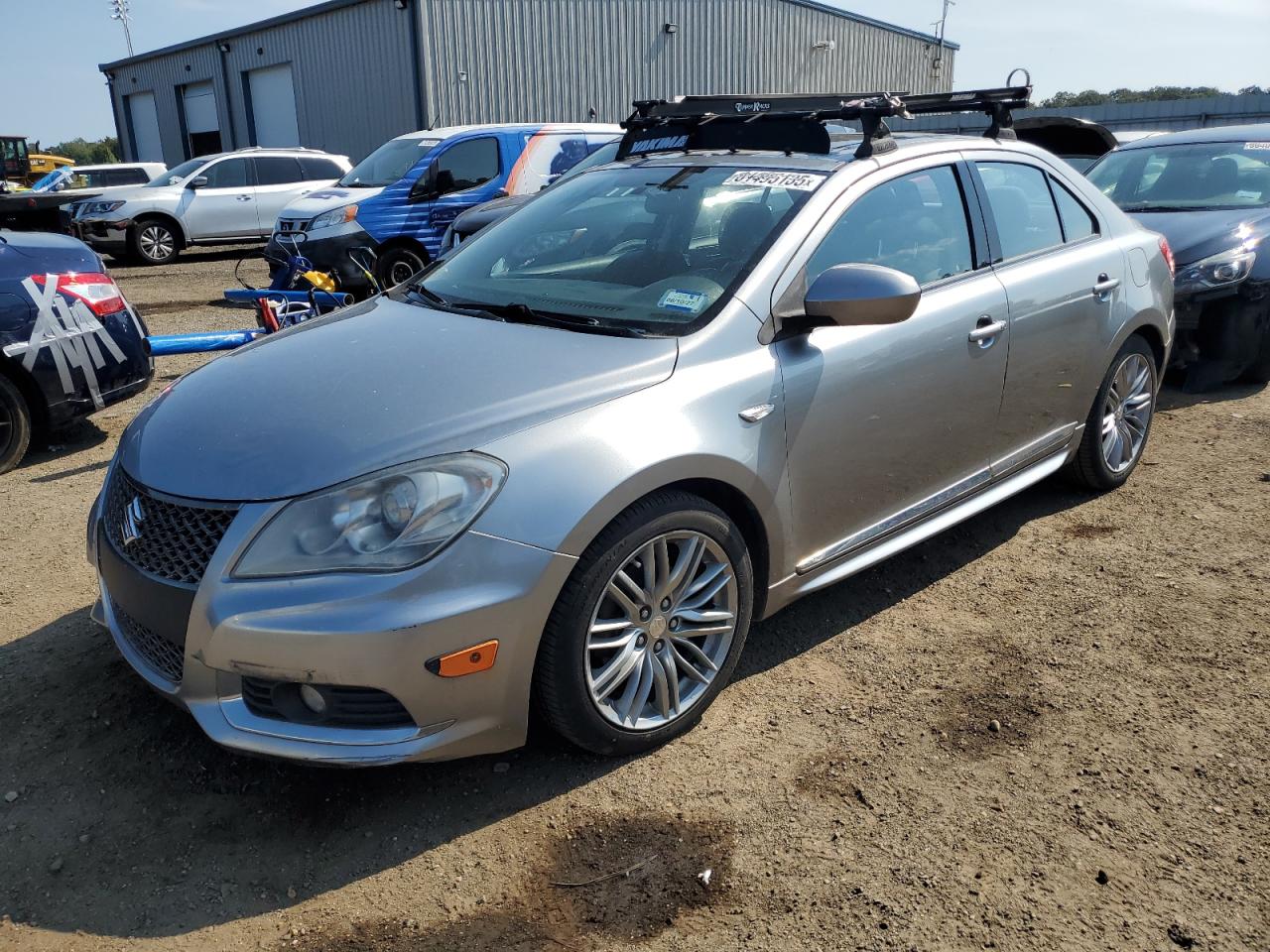 2011 Suzuki Kizashi GTS Sport, VIN JS2RF9A69B6110533 — Minor dents and scratches