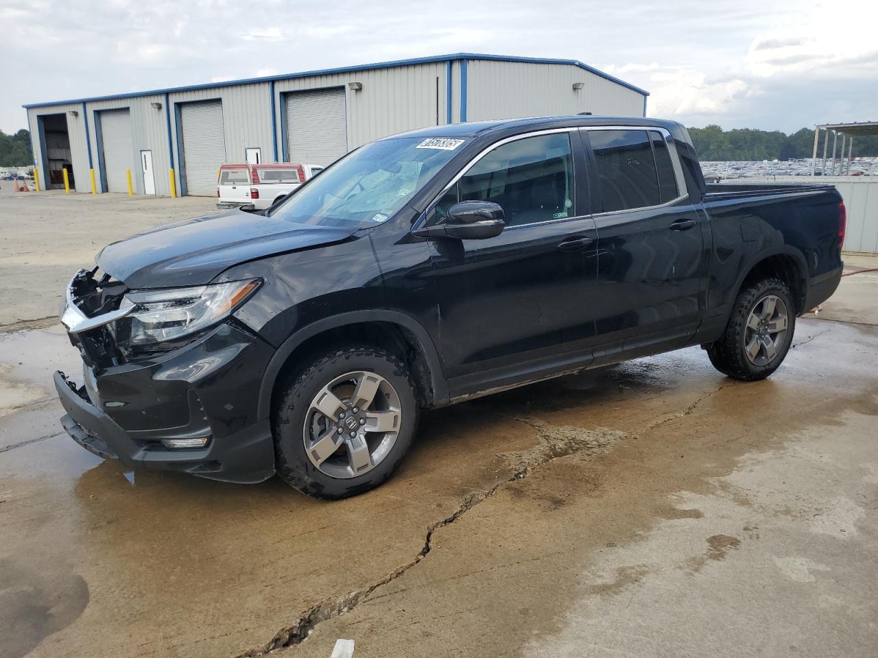 2025 Honda Ridgeline RTL, VIN 5FPYK3F5XSB041815 — Front end