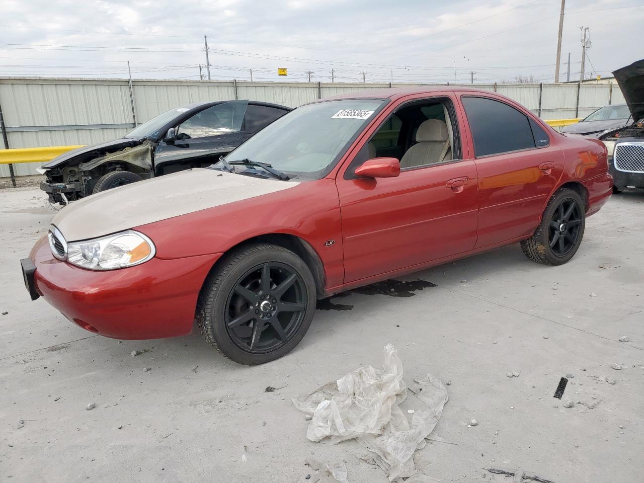 1999 Ford Contour LX, VIN 1FAFP6537XK234605 — Rear end
