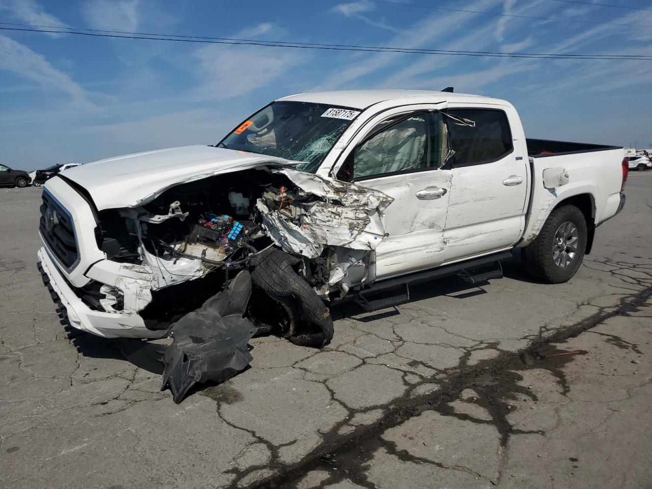 2019 Toyota Tacoma SR5, VIN 5TFAZ5CN4KX073509 — Front end